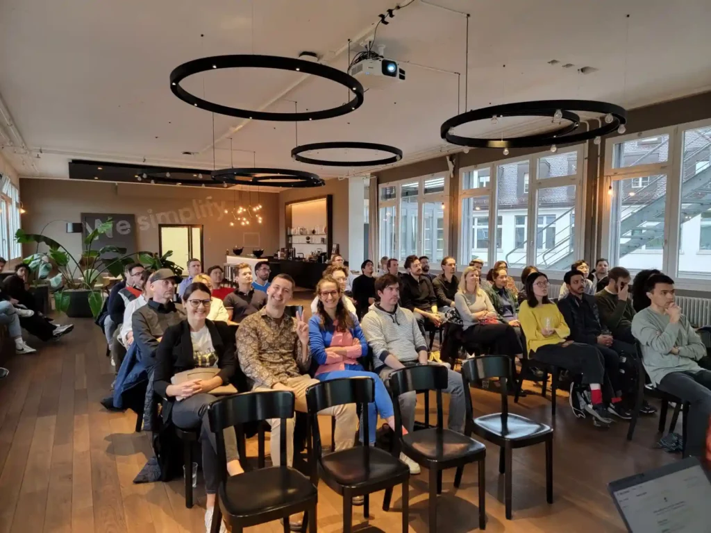 Audience at a GenAI 360 in-person AI networking event in Zurich