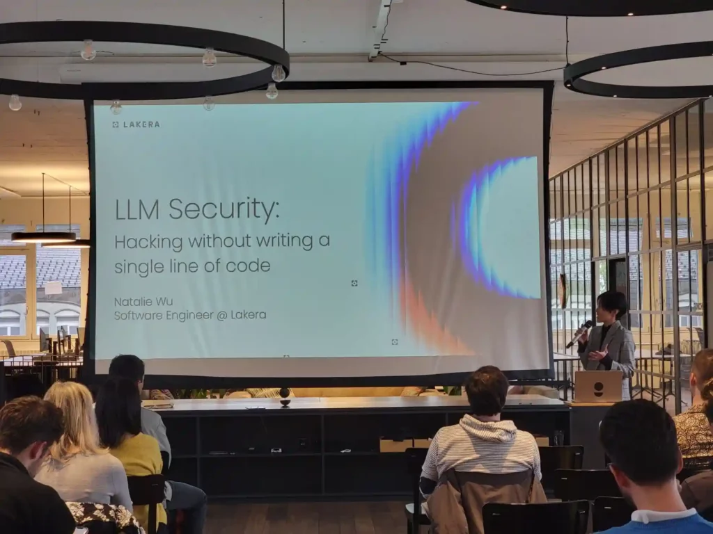 Speaker presenting on LLM security at a GenAI 360 AI event in Zurich